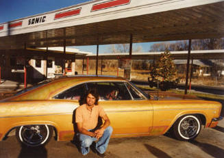 Carlos Archuleta, Espanola, '66 Chevy, from the "Lowriders: Portraits from New Mexico" portfolio