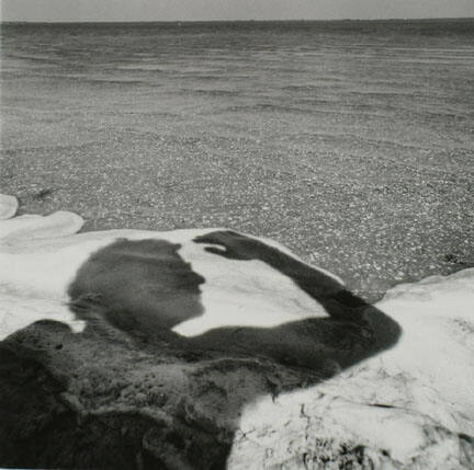 Figure Shadow in Beach Water