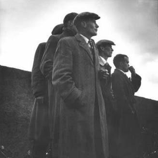 Sunday afternoon hurling absorbs the attention of the parish's men.