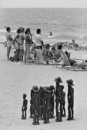 People and Statues on Beach, San Juan, Puerto Rico