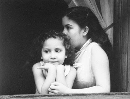 Two Sisters in Window