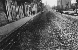 Strada Putnei, known as die Yiddengasse, where many Jewish-owned shops used to be located. The cobblesstones have been replaced since the photograph was made, from the “The Last Jews of Radauti” series