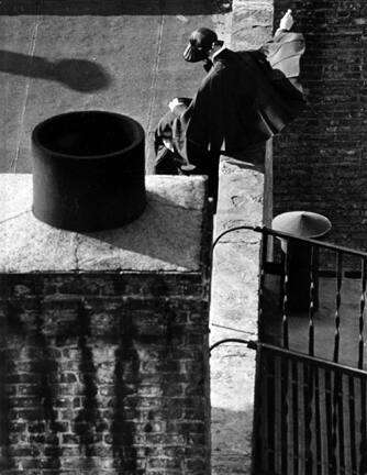 New York (nun reading on rooftop)