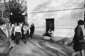 Untitled (man reading in door way to arch, Washington Square Park)