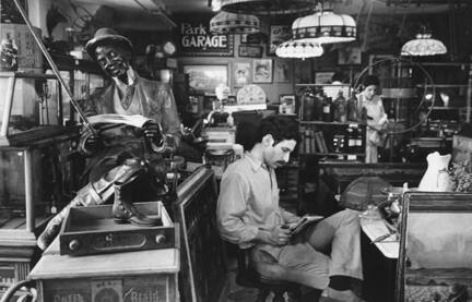 Second Avenue, New York (man reading in antique store)