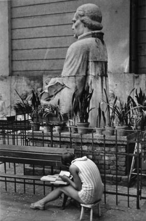 Budapest (large statue and woman reading on stool)