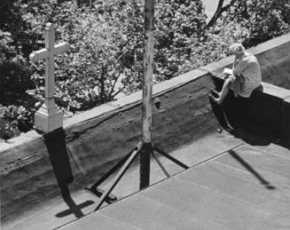 Greenwich Village, New York (cross and woman on roof)