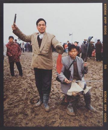 Lian Xianchuang (left) Age 49, from the "Ma Jie" series