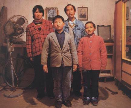 The Family of Xue Baochuan (39-Years-Old) at Hanwangcheng Village, Guangwu Town of Xingyan City, in 2000, from the "Masters" series