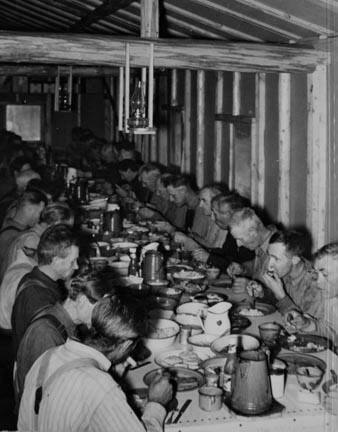 Lumberjacks at dinner. Camp near Effie, Minnesota