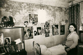 Untitled: Woman in Room with Posters