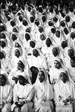 Elijah Muhammed's Grandchild in Center with Black Muslim Sisters