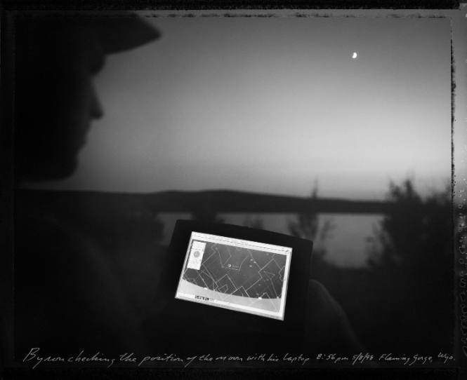 Byron checking the position of the moon with his laptop, Flaming Gorge, Wyoming 8/8/97