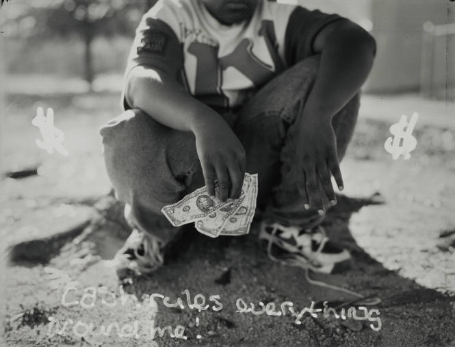 Jonathan Leak, African American, Black Self. "Cash rules everything around me!"