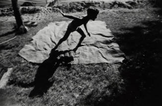 Untitled (boy running with shadow)