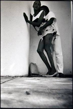 Hip Shots: Woman in short skirt posing with man, New York