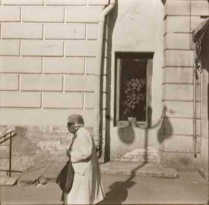 St. Petersburg (woman by window/plant)