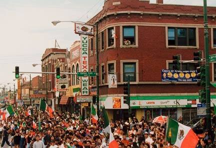 Thousands of Spectators Wave Flags and Cheer During the Annual Mexican Independence Parade Down 26th Street in Chicago's Neighborhood of Little Village, September 1994