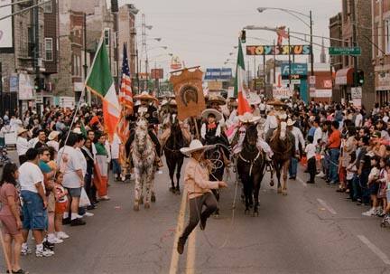 A Young Cowboy Performs Rodeo Rope Tricks as he Marches West on Cermak, During the Annual Cinco de Mayo Parade, May 1996