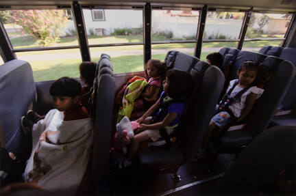 Head Start Preschoolers from the River Valley Migrant and Seasonal Head Start Center in Kankakee, Illinois, Ride the Bus to the Kankakee Center, After Being Picked Up from their Homes. The Preschoolers are Children of Migrant Workers, and Food Service Providers, September 2010