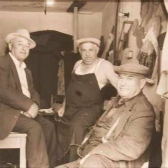 Shargorod (three men in hats)