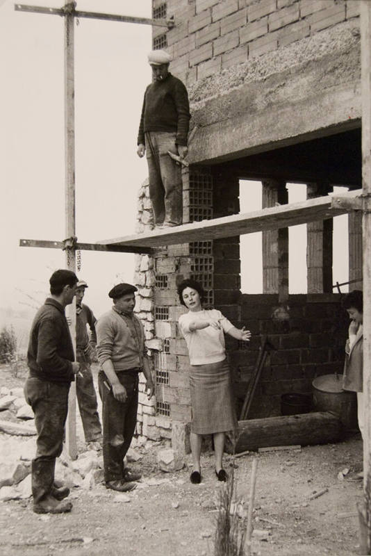 Woman Giving Directions to Construction Workers, Algeria