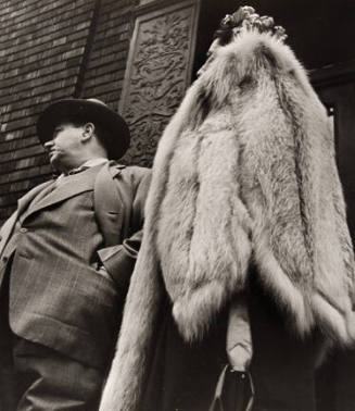 Man in Suit, Woman in Fur Coat