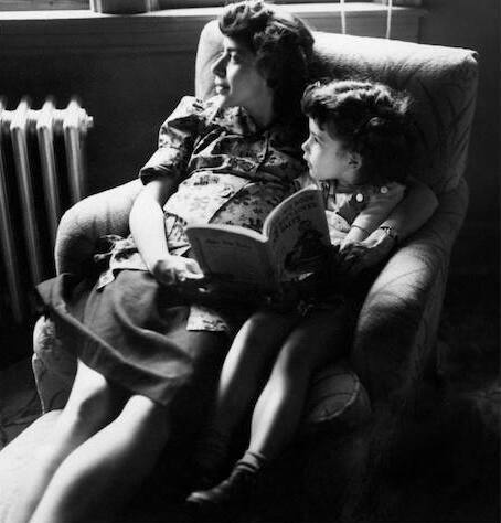 In her doctor’s office in Chicago, in 1951, Florence, pregnant with our second child, Harmon, waits with early bibliophile Jane, age 5.