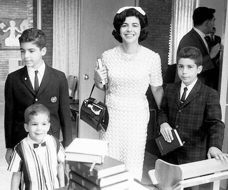 Florence wouldn’t accept any child’s excuse for poor grades. Here she silently chides Richard. One ofFlorence proudly leads sons Harmon and Steve into the synagogue for Richard’s Bar Mitzvah in 1966. Richard nervously holds his prayer book. Florence was 44.