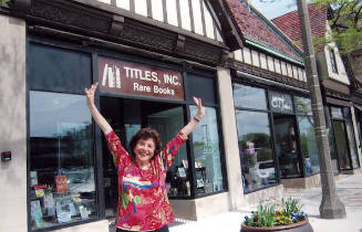 Proudly posing in front of her new shop!