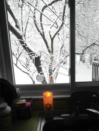 My memorial yahrzeit for Florence stands in our kitchen, from which Florence observed the changing of our seasons.