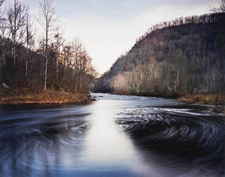 Foam from upriver pollution, Pigeon River, Tennessee