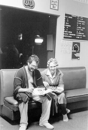 A Couple Chows Down at a Halloween Candle Light Bowling Game, October 31, 1987