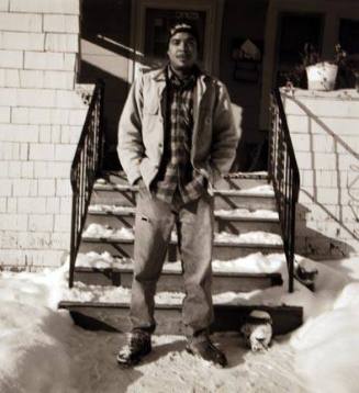 Untitled (man with snow in front of stairs)