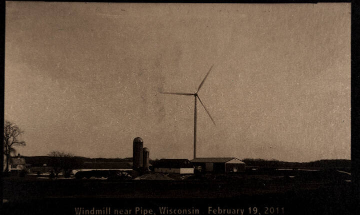 Windmill near pipe Wisconsin February 19, 2011, from the "Real Photo Postcards of People & Places" series