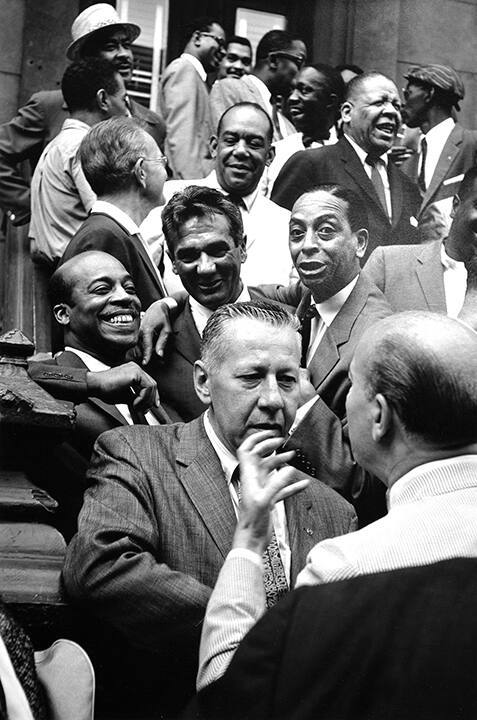 The Drummers (First row) George Wettling and Bud Freeman; (Second Row) Jo Jones, Gene Krupa, and Sonny Greer; (Third Row) Miff Mole, Zutty Singleton, Red Allen, and Taft Jordan; (Top row) Dickie Wells, Buck Clayton, Benny Golson, Art Farmer, Hilton Jefferson, and Art Blakey, Esquire Magazine Shoot, Harlem, NYC