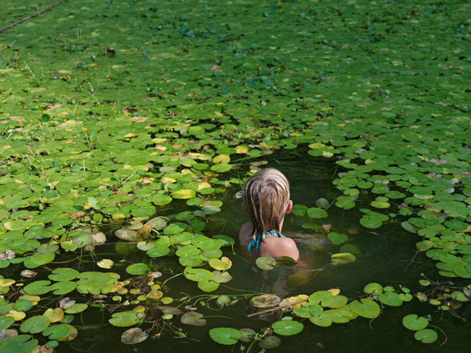 Maddie with Invasive Water Lilies, North Carolina, from the "Human Nature" series