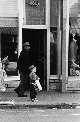 Child holding a confederate flag