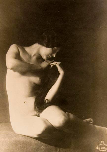 Untitled #56 (seated female nude, 2 hands under left cheek)