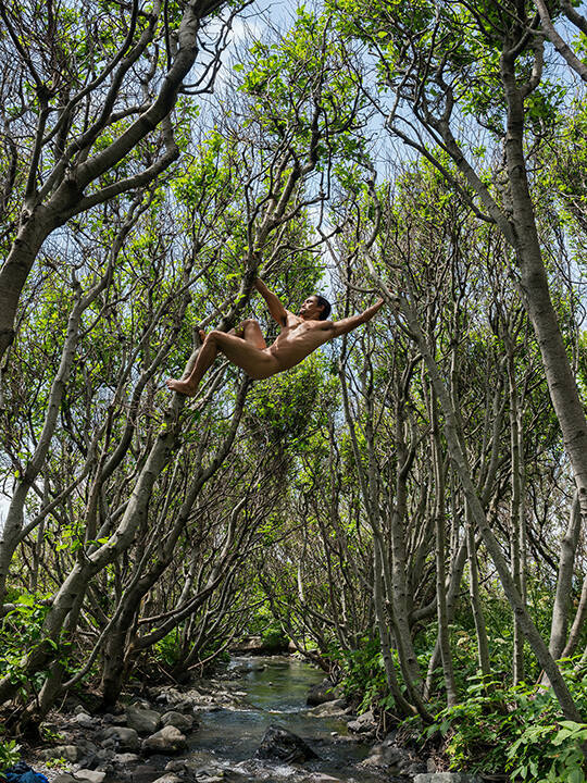 Matt Swinging between Trees, Lost Coast, California from the "Human Nature" series