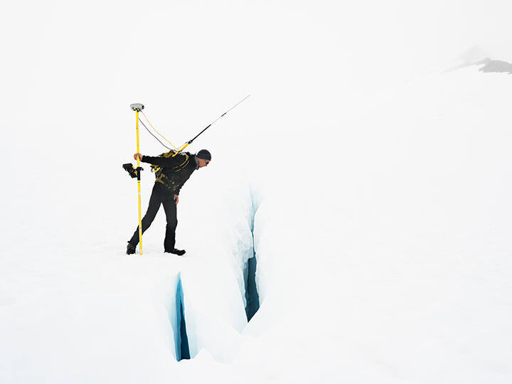 Uwe Measuring the Velocity of a Glacier, Juneau Icefield Research Program, Alaska, from the "Human Nature" series