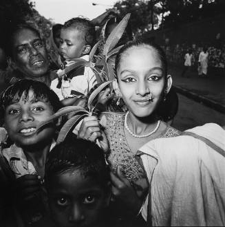 Girl with Mango Twig, India