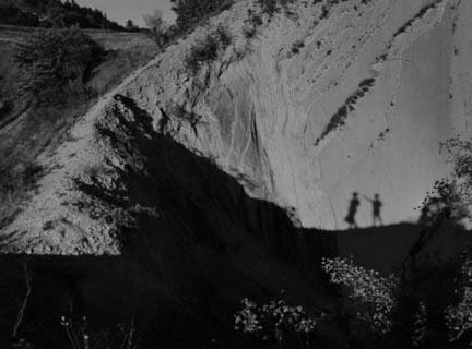 At Hlubocepy (two figures in front of mountain)