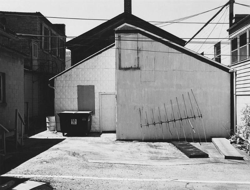 Waupun, WI [storefront buildings from back alley], from the "Sites of Southern Wisconsin" series