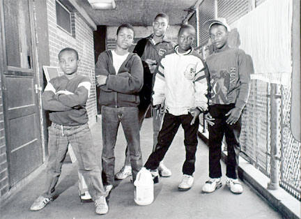 Group of five boys on balcony, Cabrini-Green, from Changing Chicago