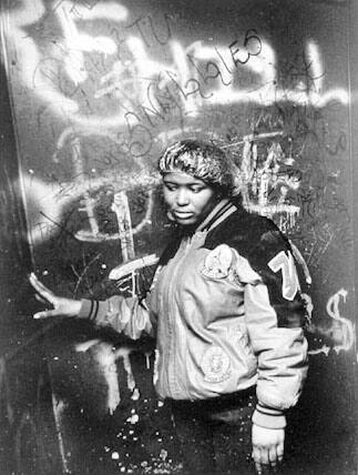 Woman with plastic hair protector in elevator, Cabrini-Green, from Changing Chicago