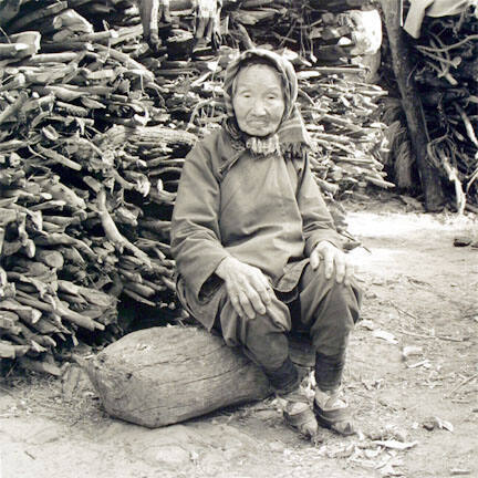 Wood Gatherer with Bound Feet Along the Burmuda Road