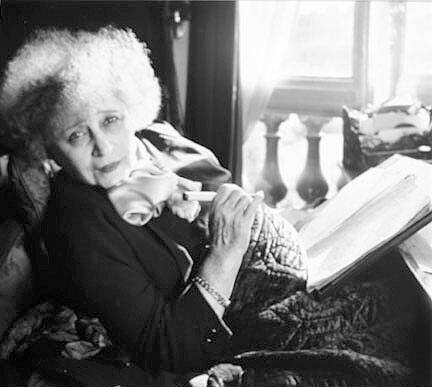 Colette in her apartment in the Palais Royale, Paris, Harper’s Bazaar